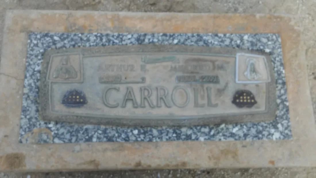 Before and after of monument with and without any black paint in sandblasted lines